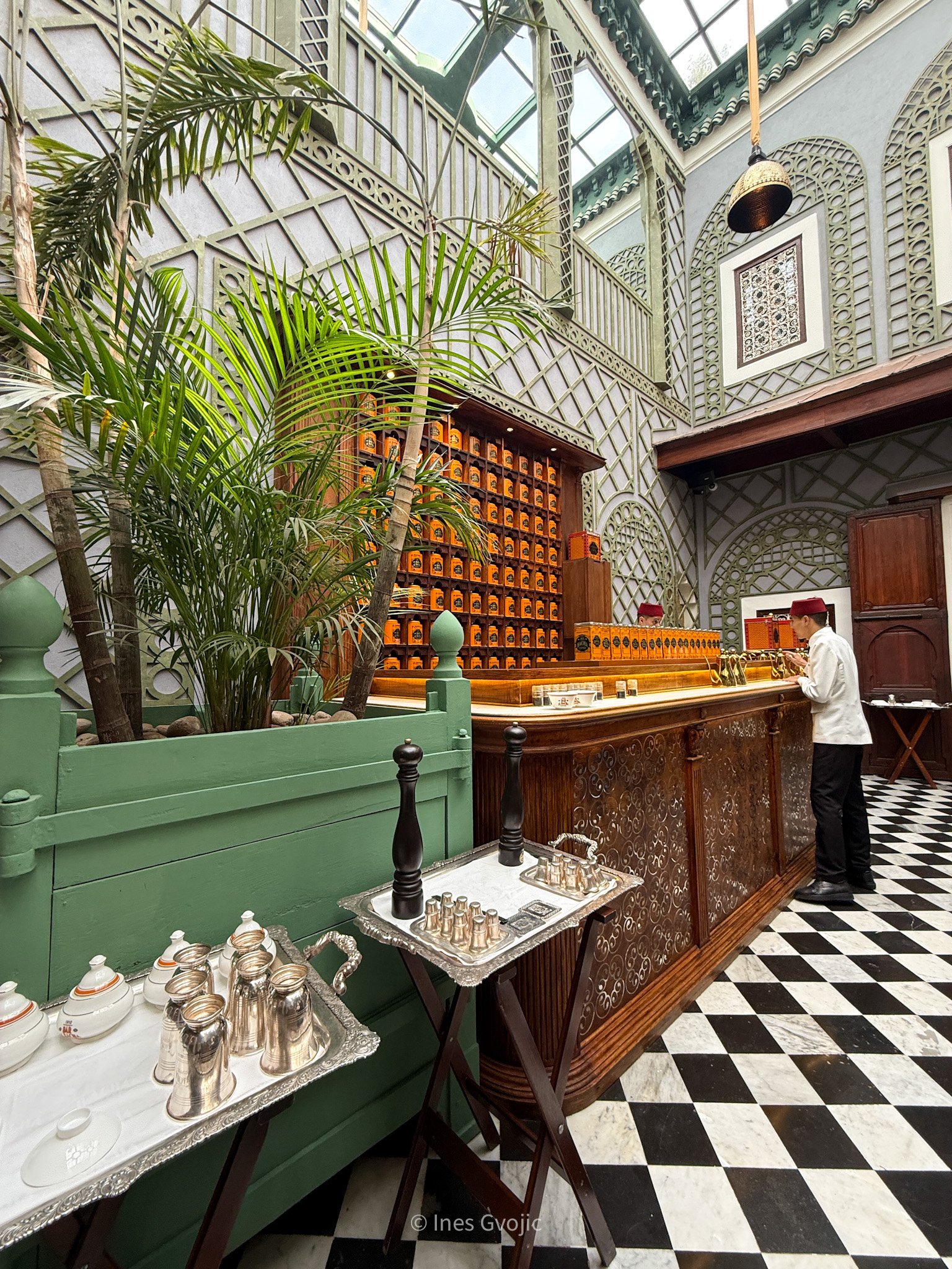 Interior of Bacha Coffee in Marrakech with classic design and coffee tins on display