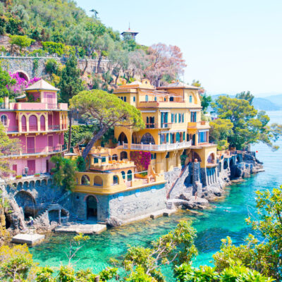 Colorful coastal villas in Portofino, Italy, overlooking the turquoise waters of the Italian Riviera